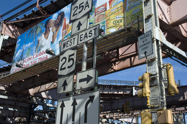 A mix of billboards, highway sign directions, and
restrictions.