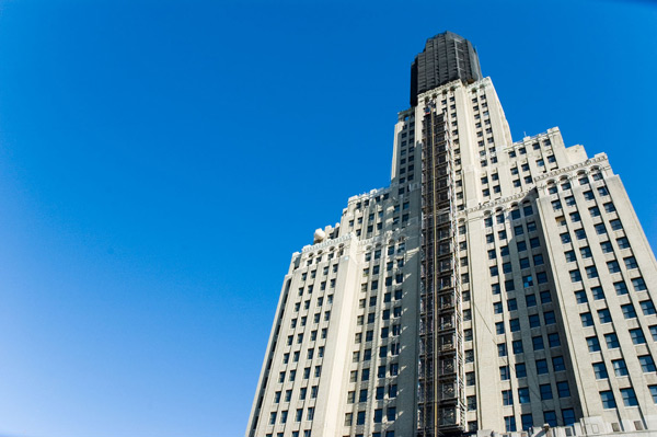 The Williamsburgh Bank Building, tallest in Brooklyn, looms
over the view.