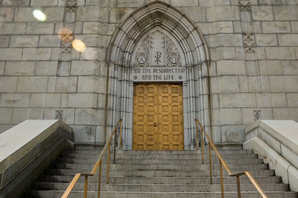 Stairs lead up to the entrance of a chapel.