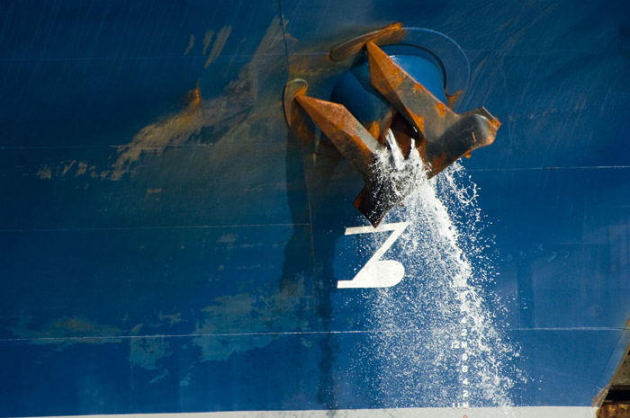 A ship empties its bilge.