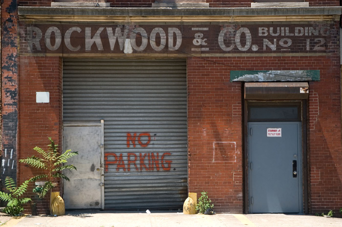 A building's old painted letters announce its long-lost
tenant.