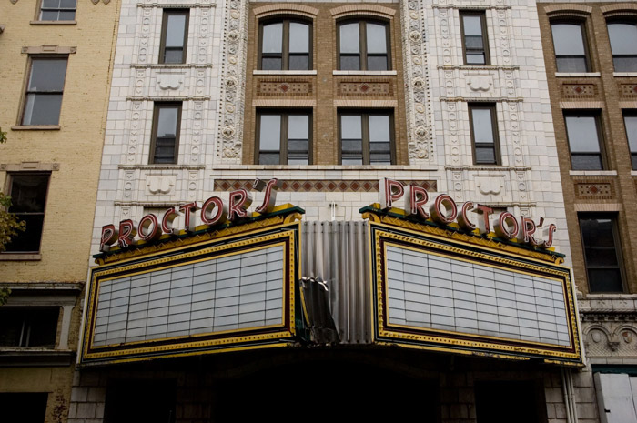 The remains of an old theater's marquis.