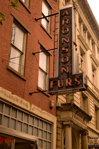 An old neon sign for a furrier, no longer in business.