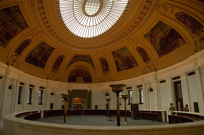 An ornate, oval room with an oval skylight.