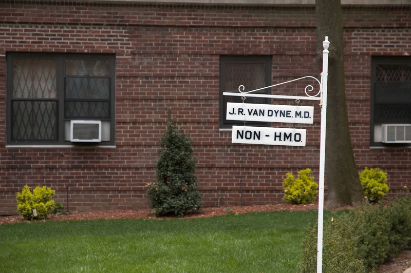 A doctor's sign warns potential patients that he won't accept peopl on HMO plans.