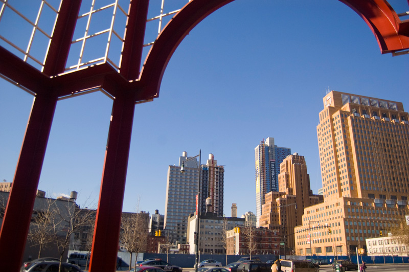 Tall buildings against a blue sky.