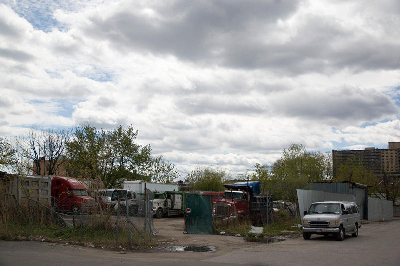 Large trucks in an isolated parking lot.