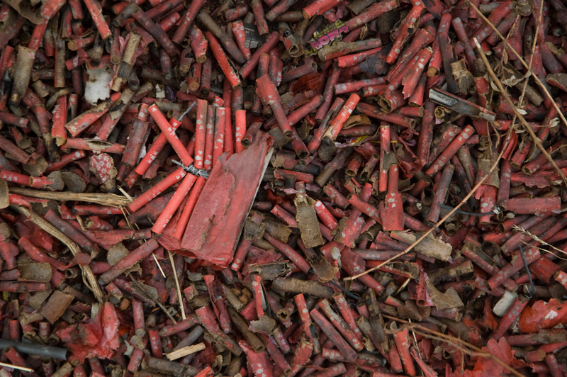 Piles and piles of used fire crackers.