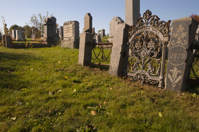 An ornamental gate, an entrance to a grave.