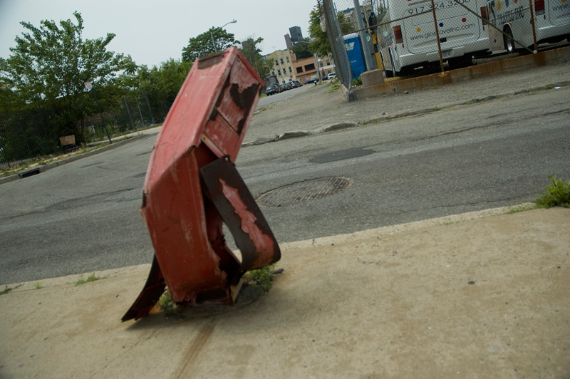 A firebox bent half-way over after a car ran into it.