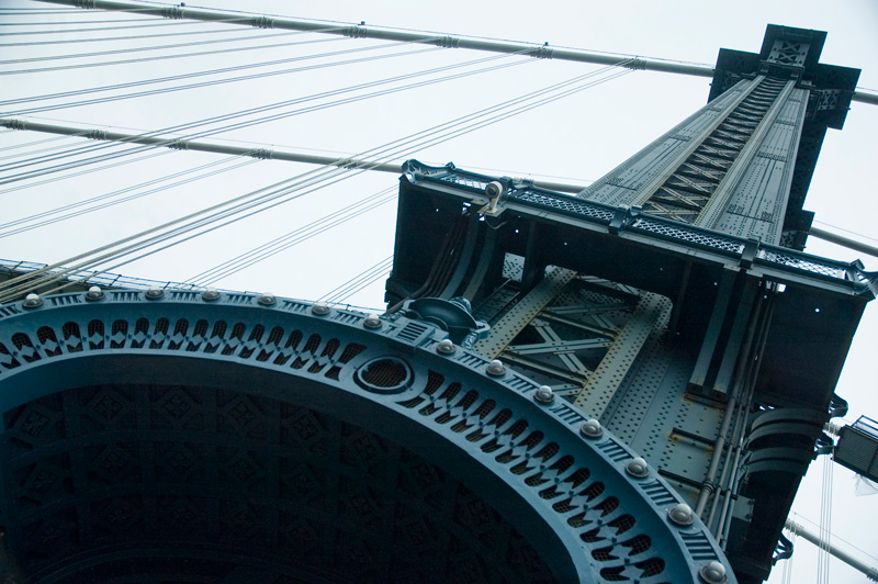 An intricate metal pillar on a bridge