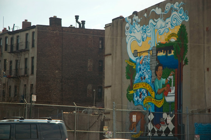 A mural on water conservation showing water's path to the faucet.