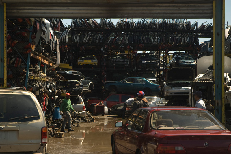 An auto parts business with lots of car doors.