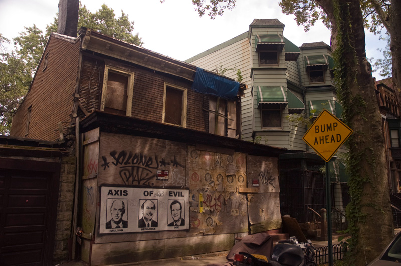 Graffiti on an abandoned house protests against the government and the financial crisis.