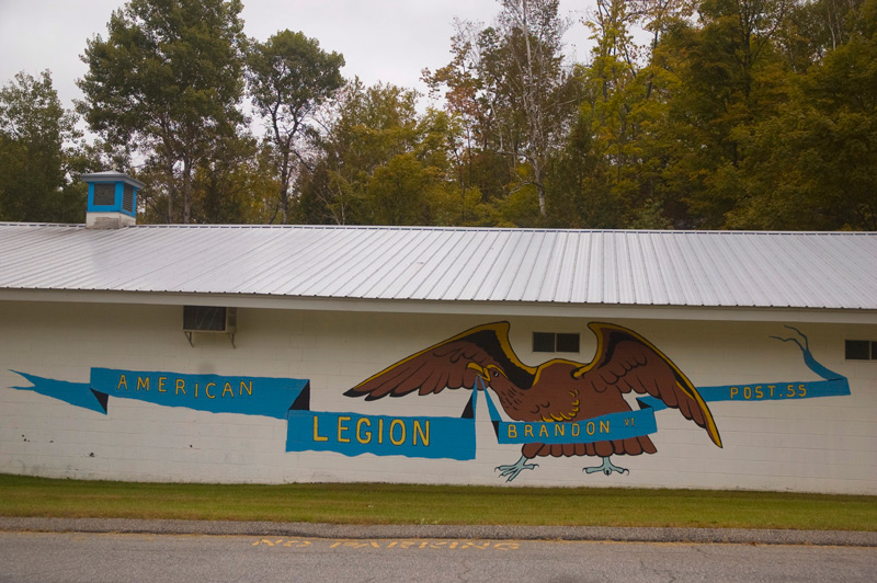 A mural of an eagle, wings spread, on a building