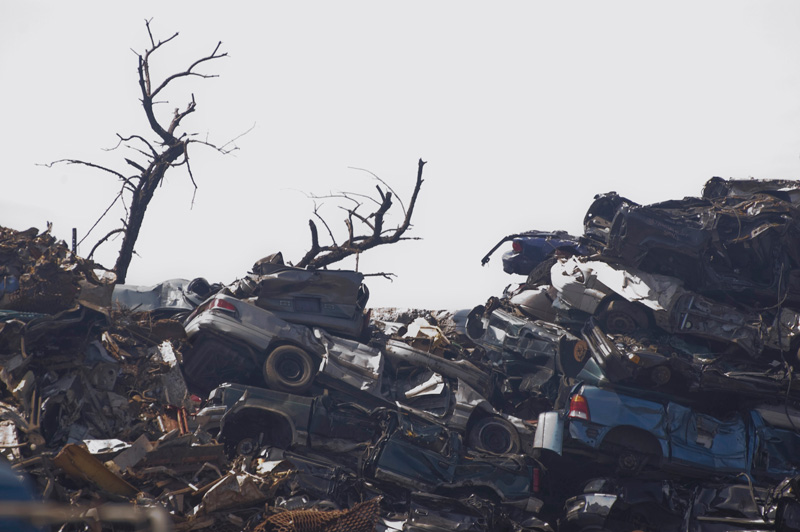 A pile of crushed cars