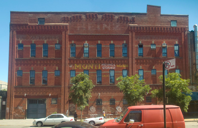 A brick building, with an old Heinz logo