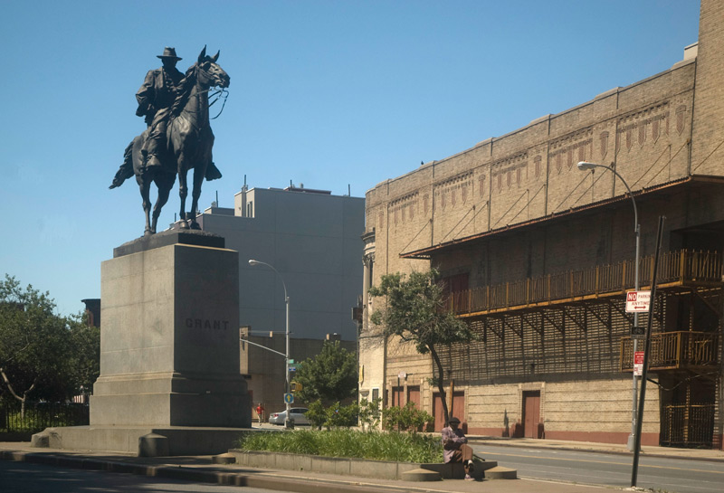 A statue of Ulysses Grant on a horse, atop a pedestal