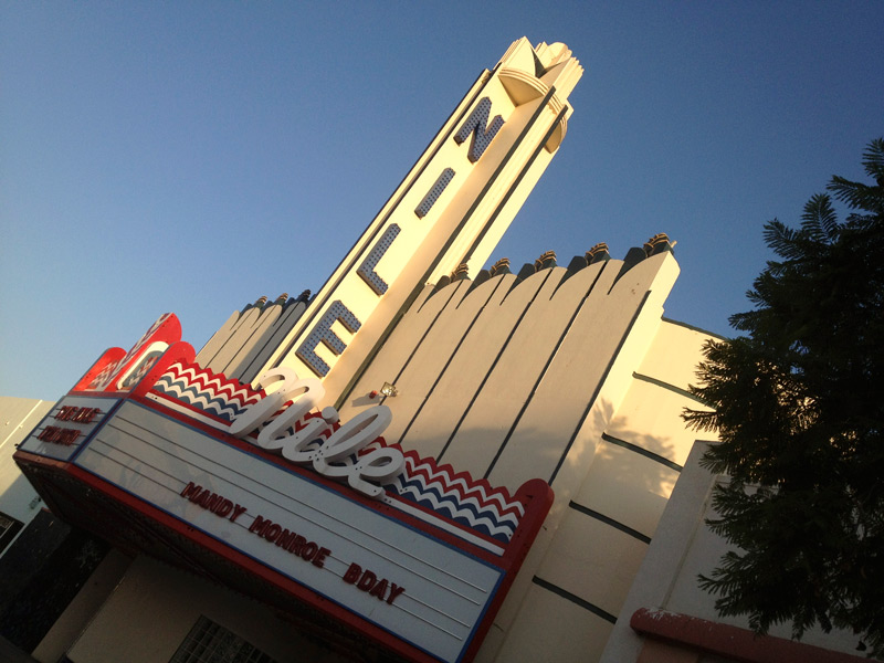 Marquis and Neon front of a theater.