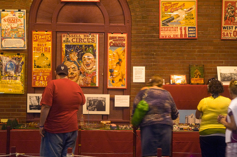 People viewing circus models.