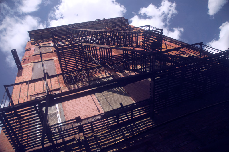 A fire escape on an isolated building.