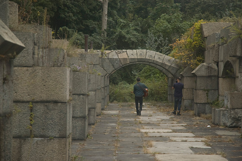 A musician, a photographer, and a stone fort.