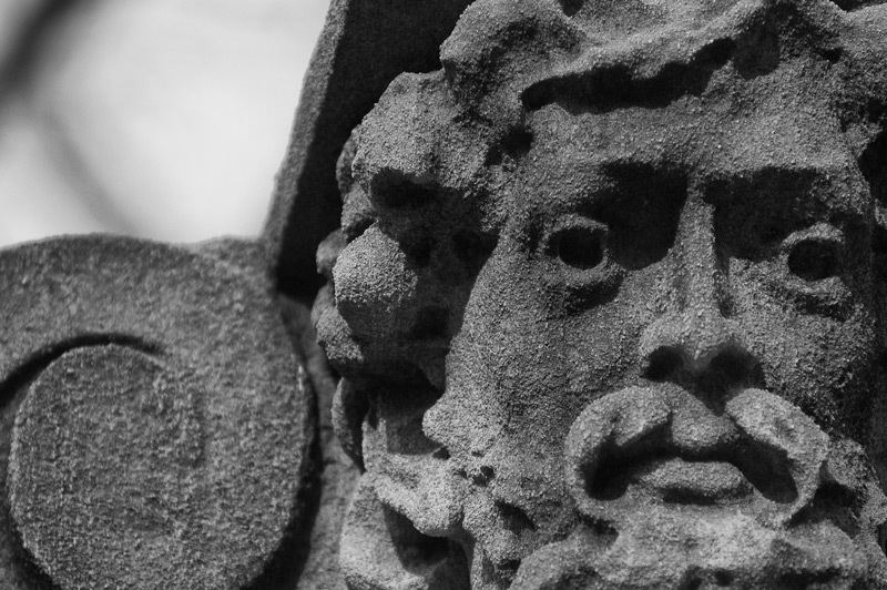 A carved face staring into the distance.