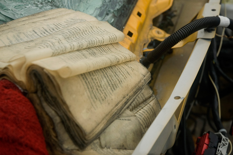 A wet book on a car.