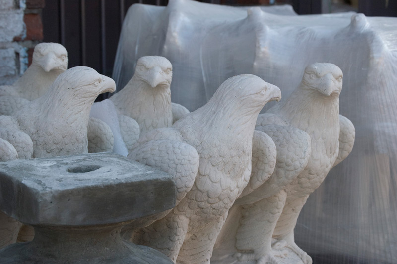 Molded figures of eagles.