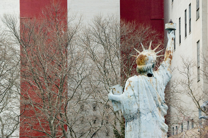 A Statue of Liberty, with signs of rust.