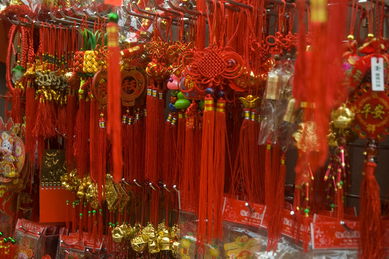 Red Chinese New Year decorations in a store.