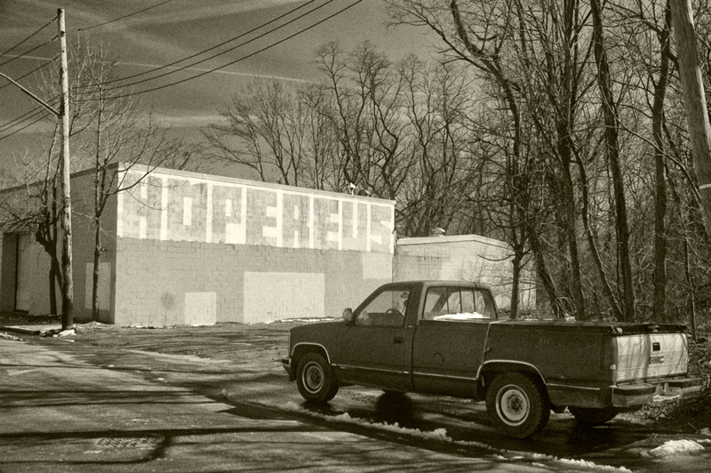 A building with 'Hope Revs' painted in big block letters