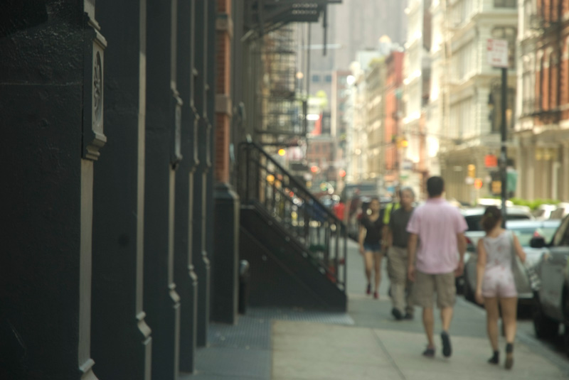 Pedestrians on a summer day in a city