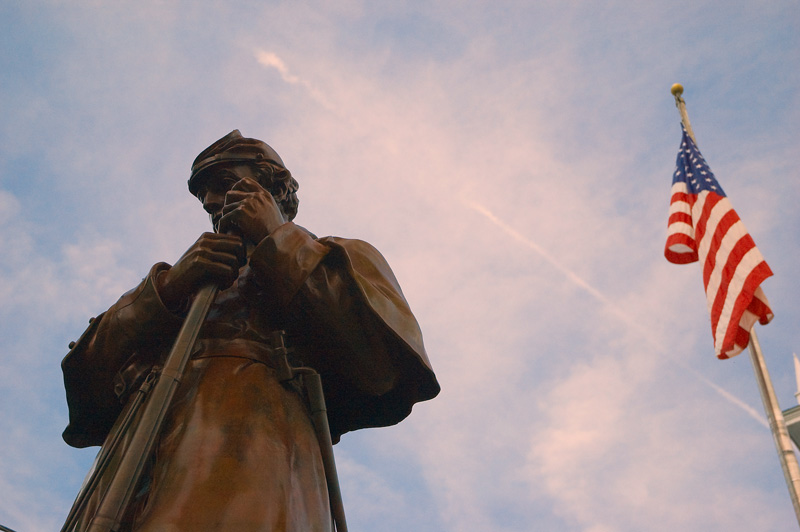 Statue of a Union Soldier by an American Flag