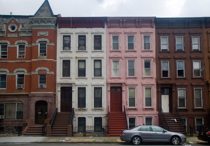 Rowhouses on a city block.