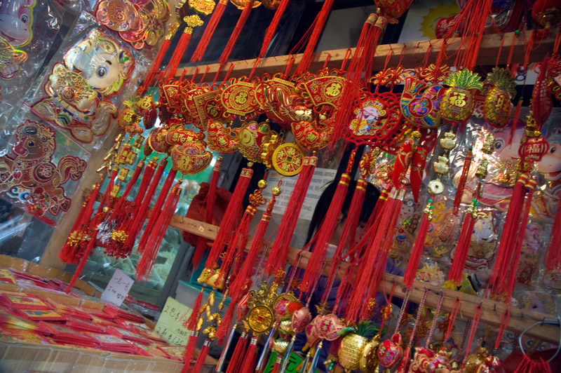 Chinese New Year Decorations hanging in a shop.