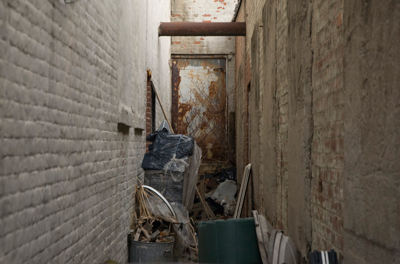 Debris in between two buildings.