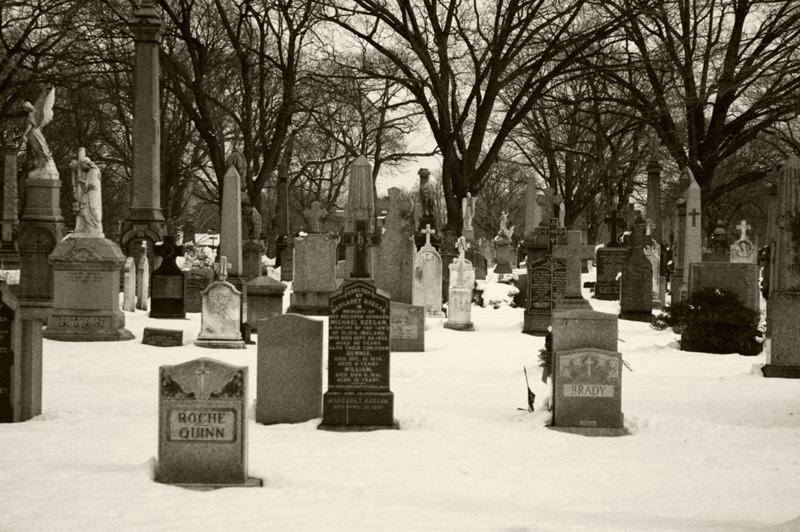 Tombstones in the snow.
