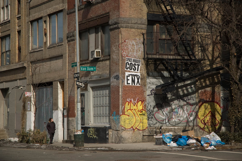 Graffiti at the corner of a building.