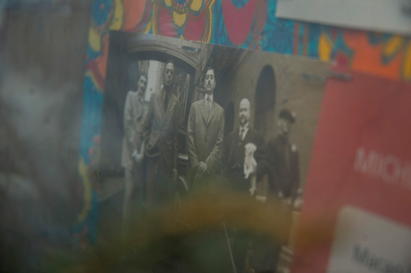 A band, in suits, in an alley.