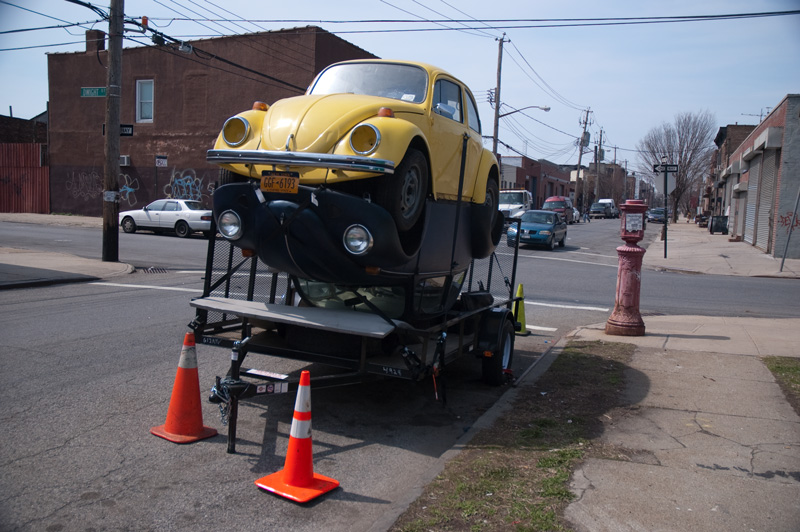 A sculpture of two Volkswagen Beetles.