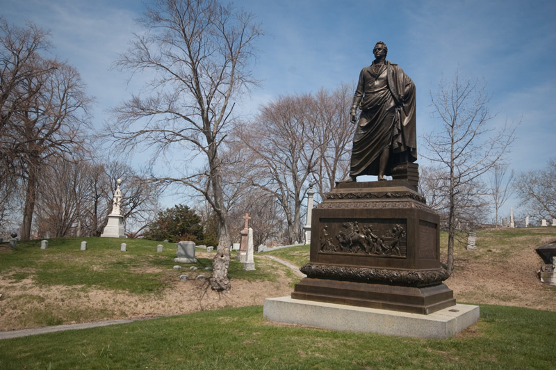 A large bronze statue of DeWitt Clinton, over his grave.