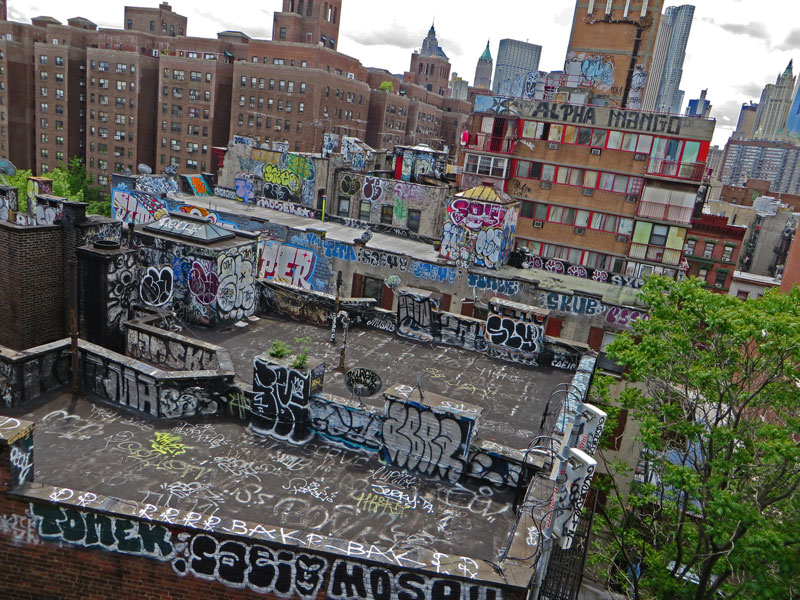 Graffiti-covered rooftops.