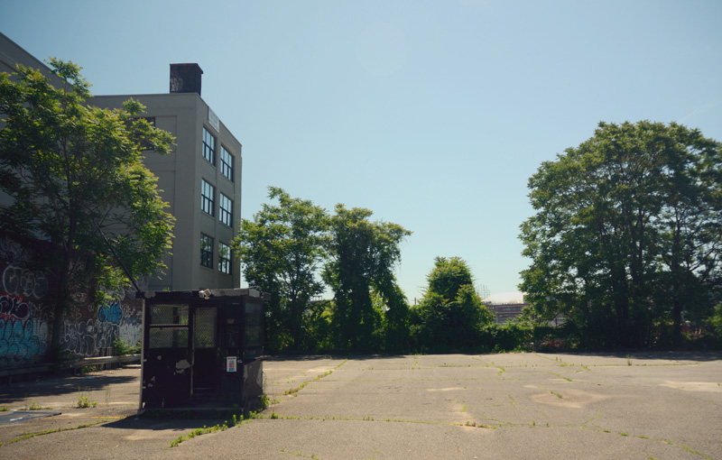 A booth in an empty parking lot.