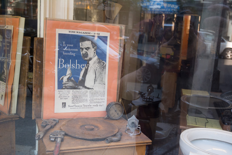 Old ad in a plumber's window.