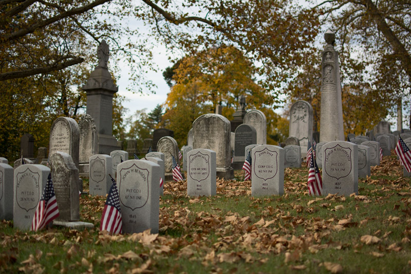 Civil War tombstones on a hill in a cemtery.