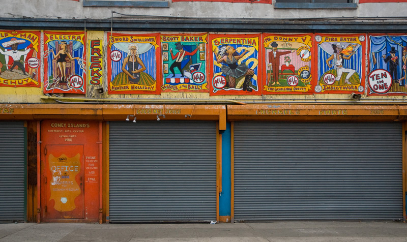 Colorful signs for performers at Coney Island