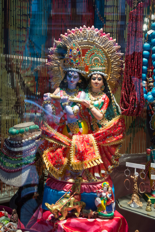 Indian deities in a store window.