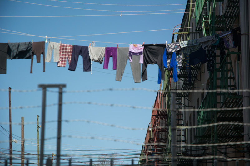 A clothesline between buildings.