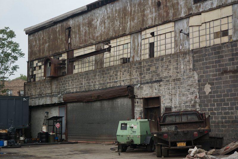 A parking lot at an industrial company.